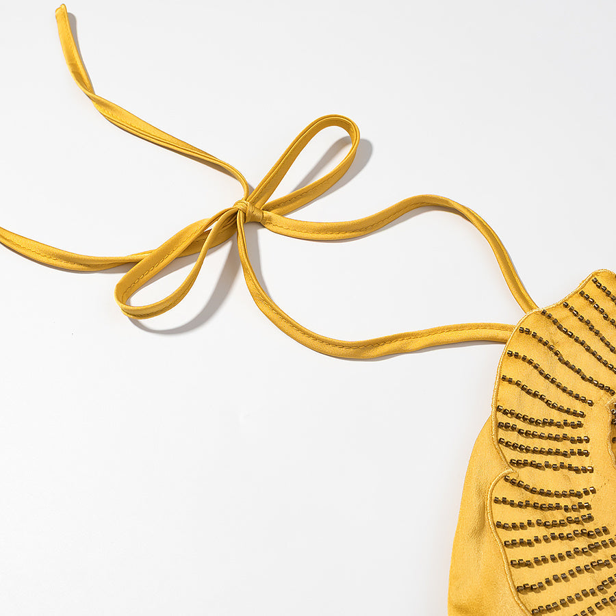 Halterneck Maxikleid mit Rüschenblume in Sonnengelb